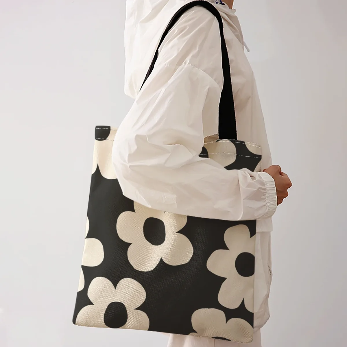 sac fourre-tout à imprimé floral simple beige sur fond noir, sac à bandoulière de grande capacité pour le shopping, les voyages et l'usage quotidien