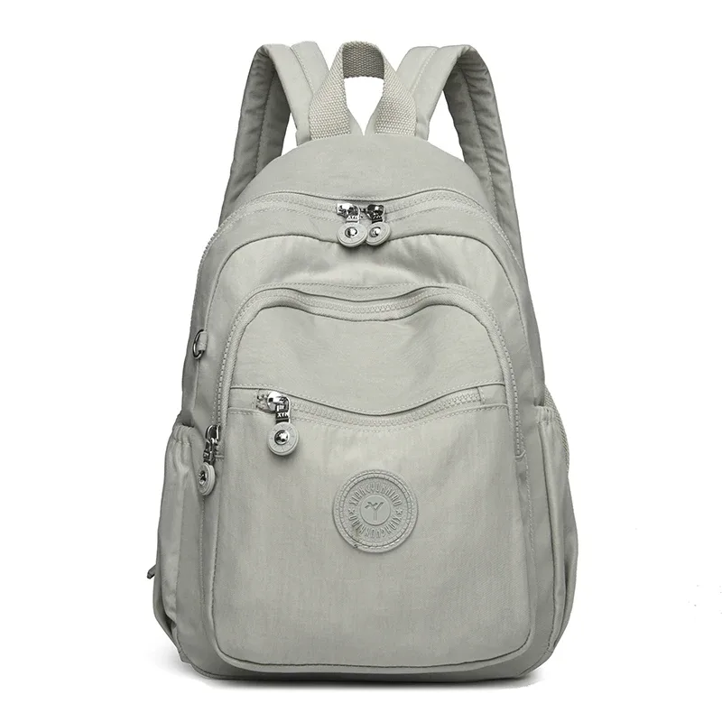 sac dos nylon unisexe noir poche latérale fermeture éclair doublure beige imprimé usage journalier