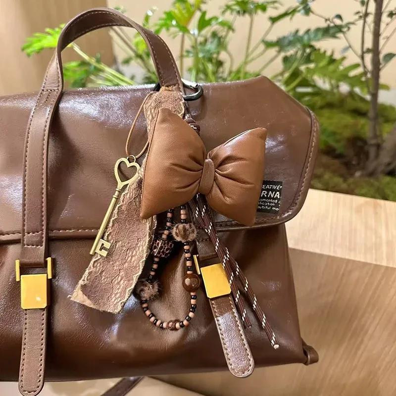 porte-clés à nœud en cuir matelassé doux, organisateur, mini breloque de sac mignon pour filles, porte-clés à nœud coréen avec pendentif