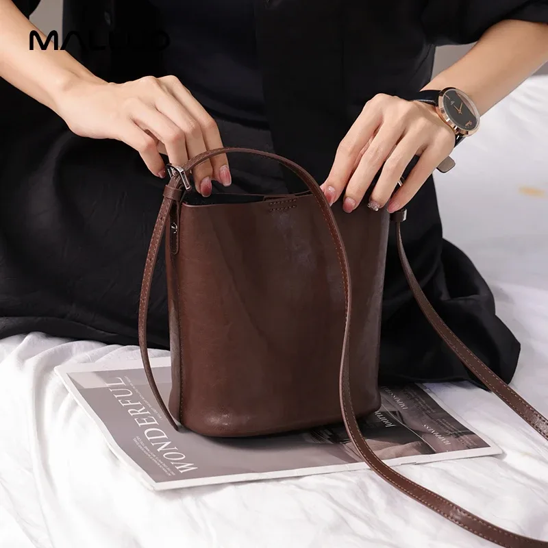 Rétro véritable peau de vache 2025 nouveau sac à bandoulière en cuir sac fourre-tout pour les femmes mode sac seau capacité sac à bandoulière sac d'été