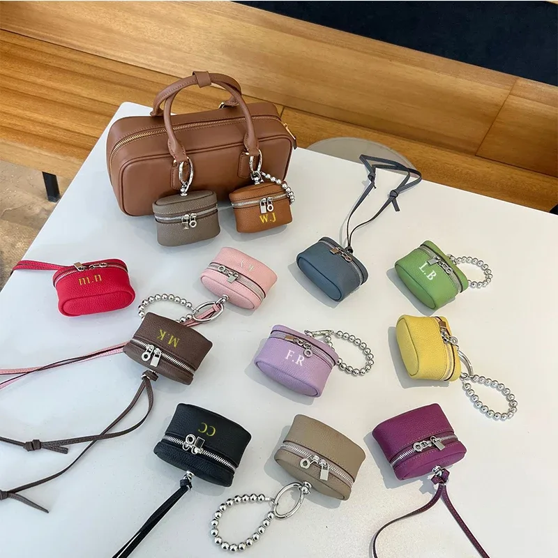 lettres personnalisées gratuites sac en peau de vache charme petit porte-monnaie ins vent simple portable sac de cou rouge à lèvres organisateur sac écouteur sac