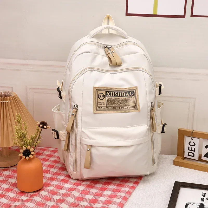 sac dos nylon solide beige rouge noir kaki décontracté poignée souple fermeture éclair usage journalier