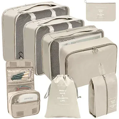 organisateur voyage polyester beige clair tissu imperméable poches maille transparente fermetures glissière poignées intégrées grande taille