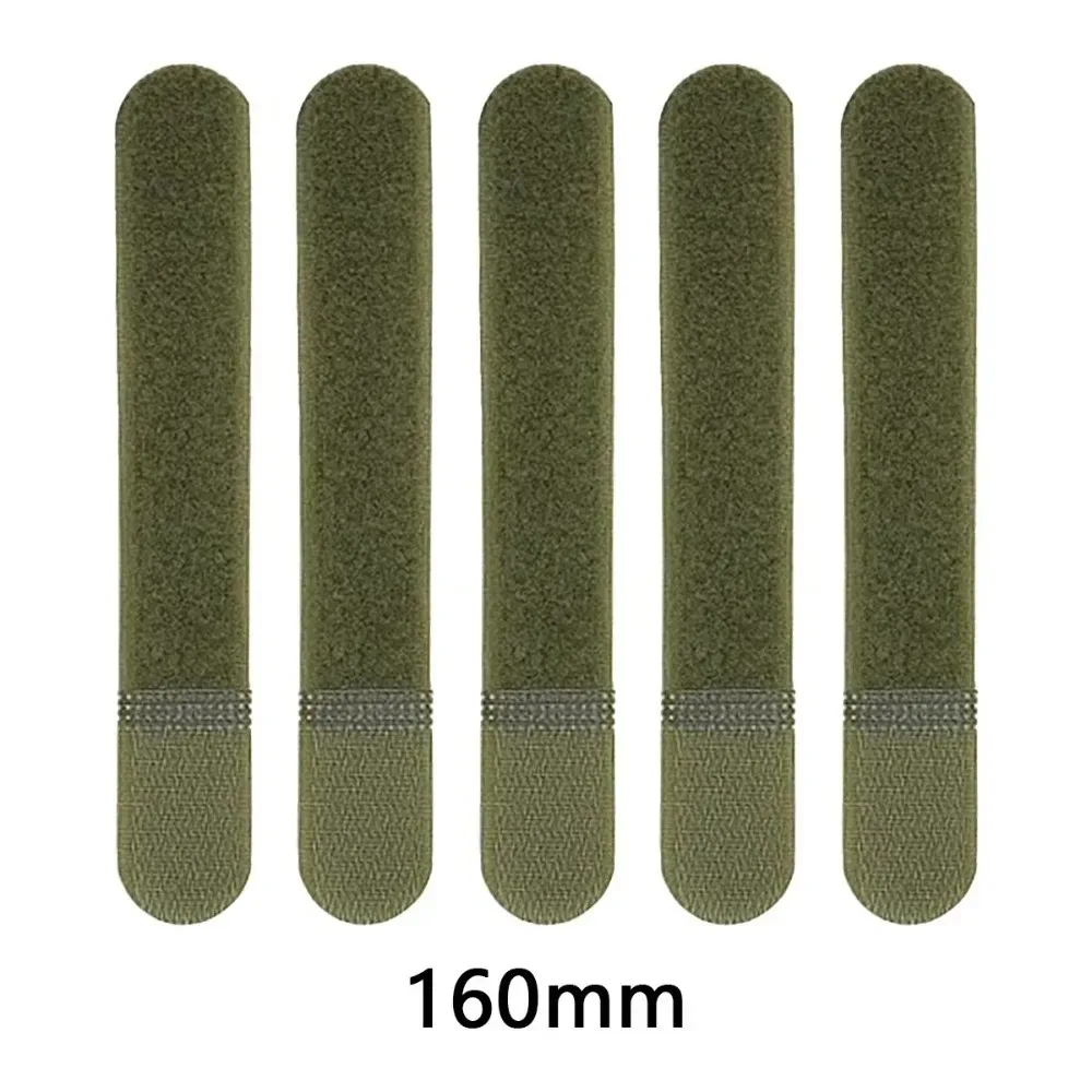 organisateur léger plastique vert olive rugueux rectangulaire grande centrale partie tissu différente fixation cordons attachement câbles organisation sac dos aventurier