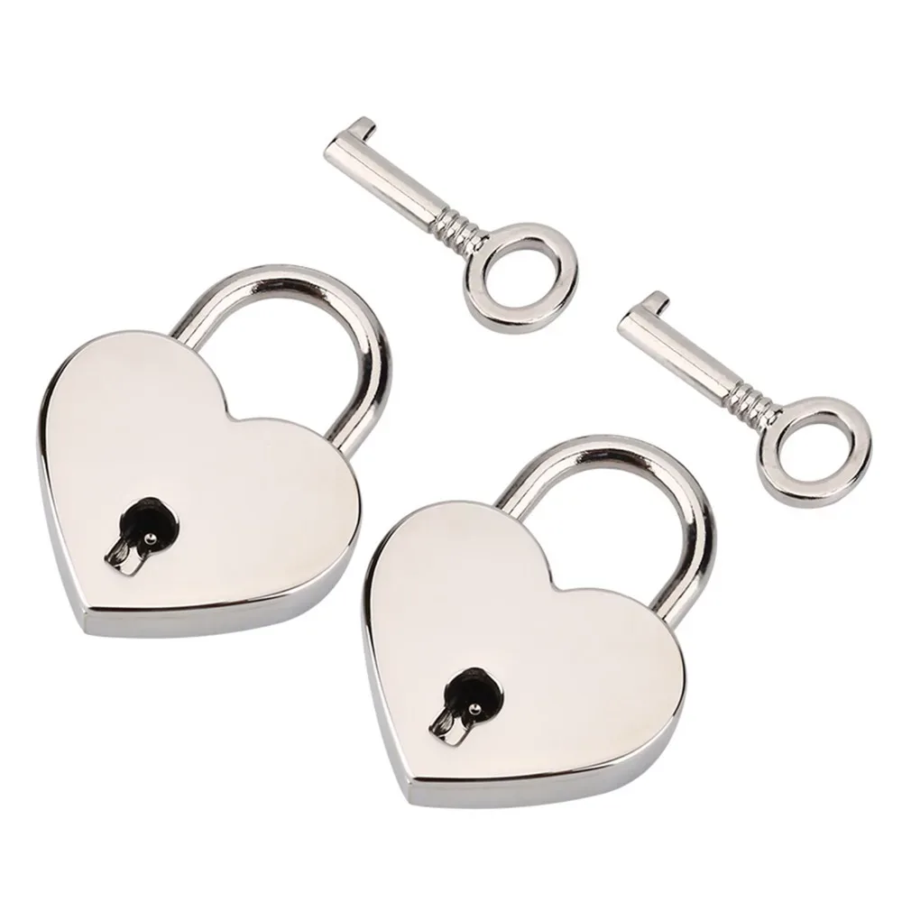 cadenas forme coeur métal argent squelette clé usage voyage sécurité robuste durabilité collectionnement présentation familiale amicale