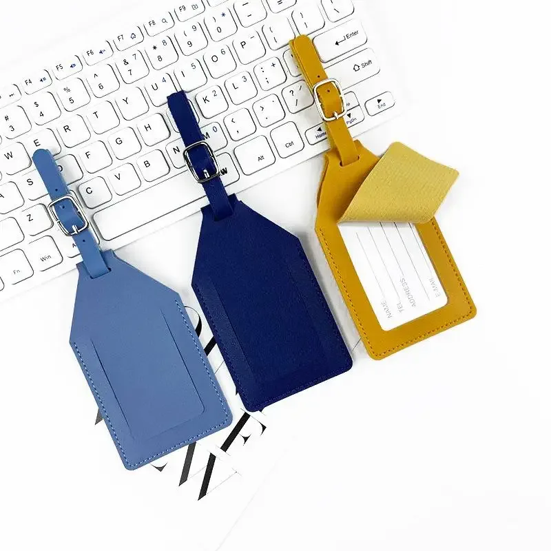 étiquette bagage métal ornamentation argent rouge doré orange vert blanc bleu marron rose voyage business classic coordonnées sécurité pratique sophistication