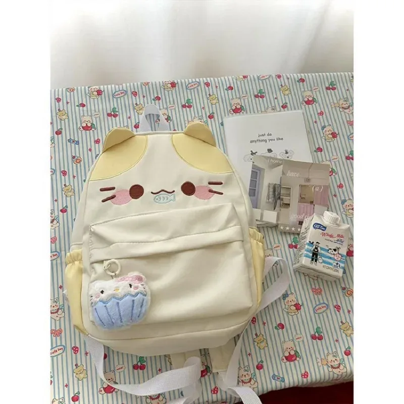 sac à dos imperméable en nylon pour femme avec motif chat dessinant une fille mangeant du poisson, sac d'école pour filles avec détails brodés, sac à livres