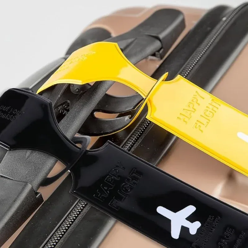 étiquette bagage plastique rouge jaune rose bleu clair noir motif avion identification voyage lot dizaine pièces