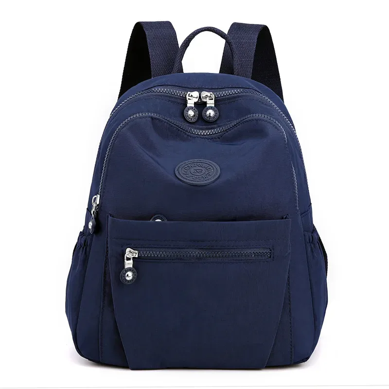 sac à dos léger en nylon pour femme, sac fourre-tout en nylon multi-poches, sac à dos décontracté imperméable pour les voyages, les trajets domicile-travail et l'usage quotidien