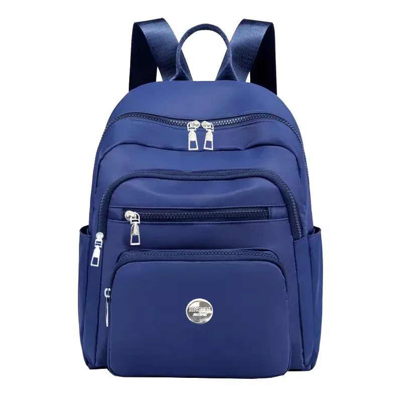 petit sac à dos noir et marron à motif quadrillé classique, plusieurs poches zippées, sac à dos décontracté et tendance, peut contenir un téléphone, des cosmétiques et des essentiels