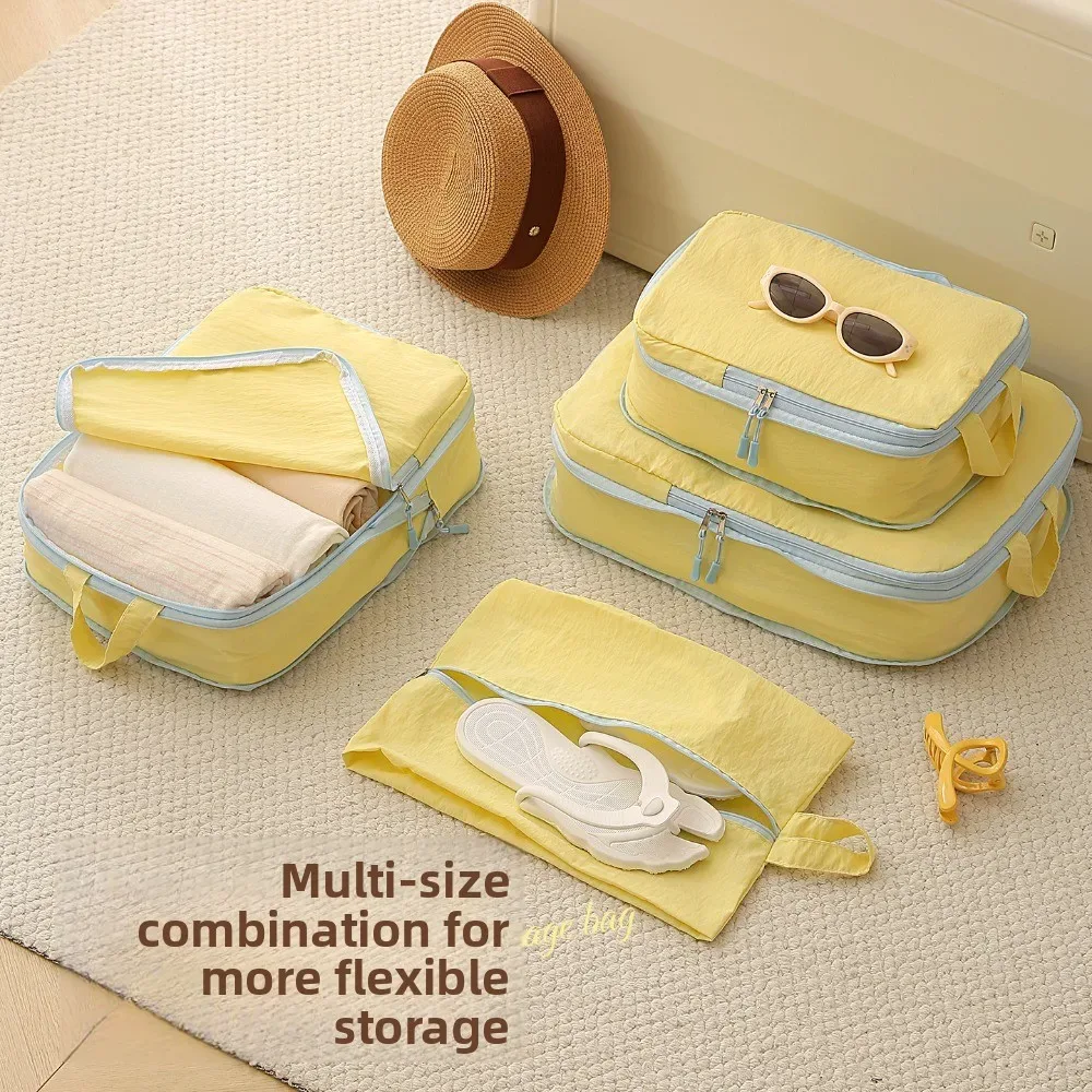 organisateur voyage compression taslan jaune bleu cube sacs chaussures rangement vacances longue durée hygiène transport