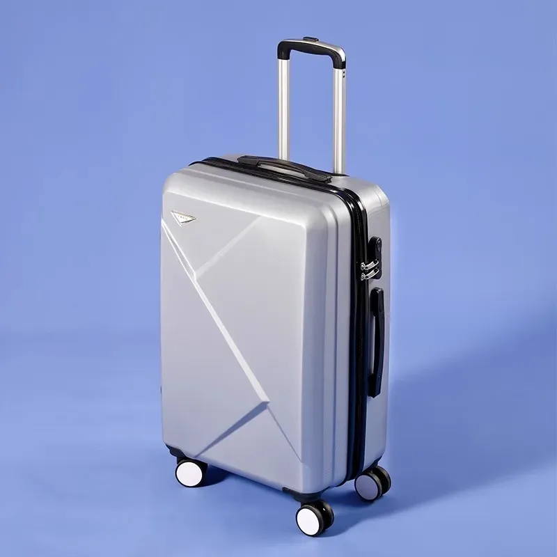 valise abs plastique dur motif géométrique lignes diagonales relief gris rose blanc jaune vert bleu rouge bagage affaires voyage