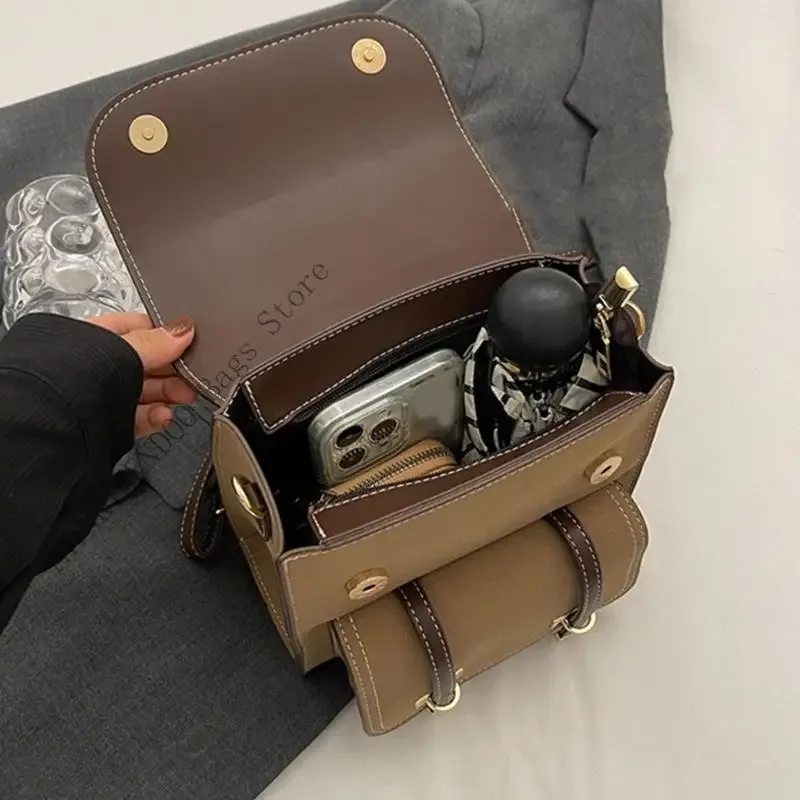 sac dos cuir pu marron beige vintage bandoulière arquée poignée souple fermure éclair compartiments organisés usage voyage fête travail