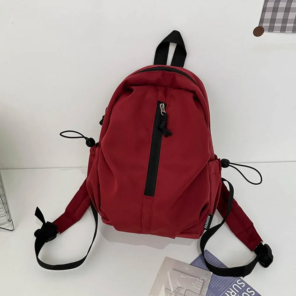 nouveau sac à dos simple de grande capacité, léger et étanche, sac à dos de randonnée avec fermeture éclair, couleur unie, sac d'université pour l'extérieur
