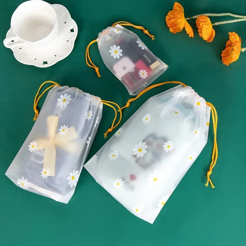 organisateur voyage transparence motif fleurs blanches fond gris corde jaune nylon plastique petit moyen grand