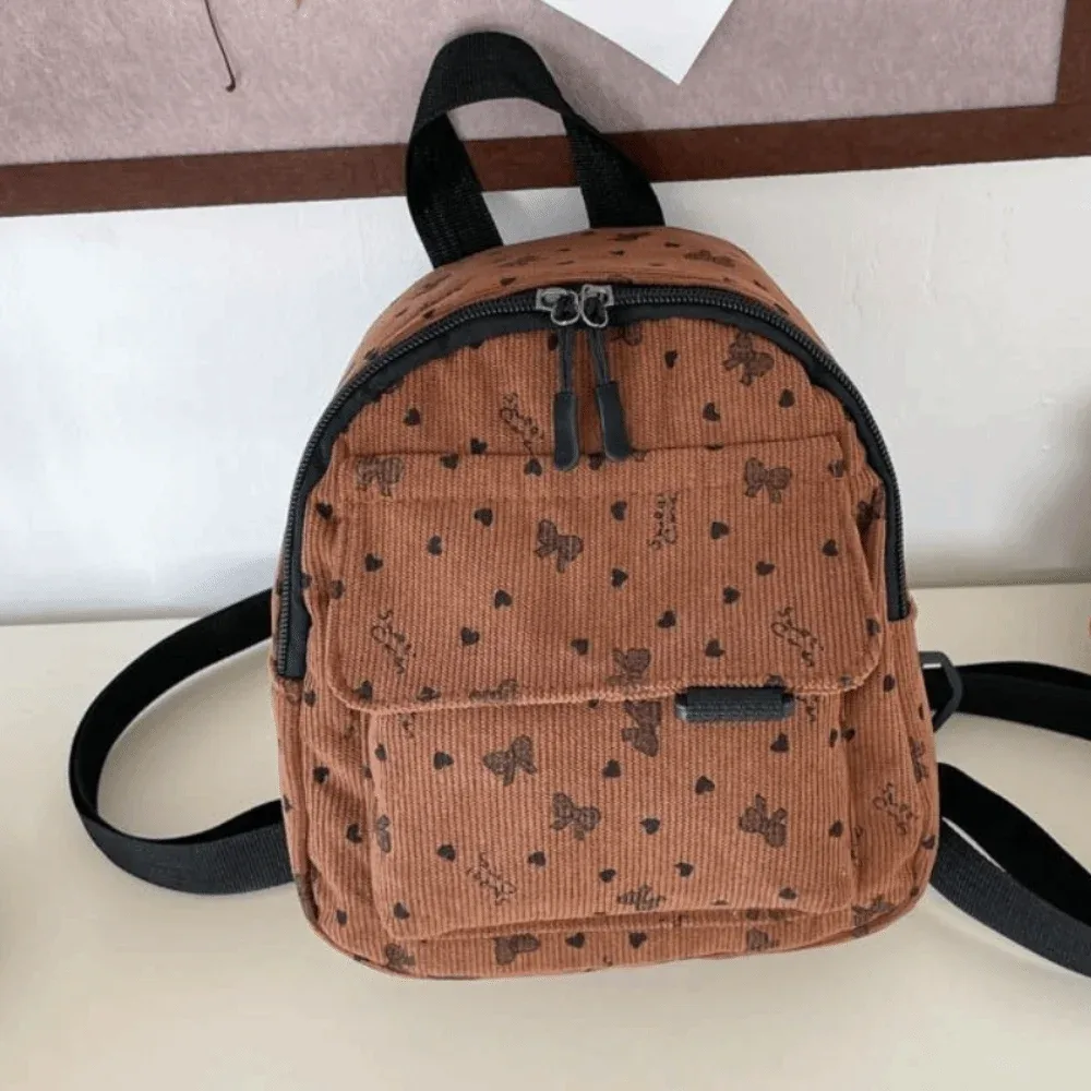 mini sac à dos en velours côtelé léger avec imprimé cœur et nœud, sac à bandoulière multi-compartiments à ouverture zippée, sac à dos quotidien