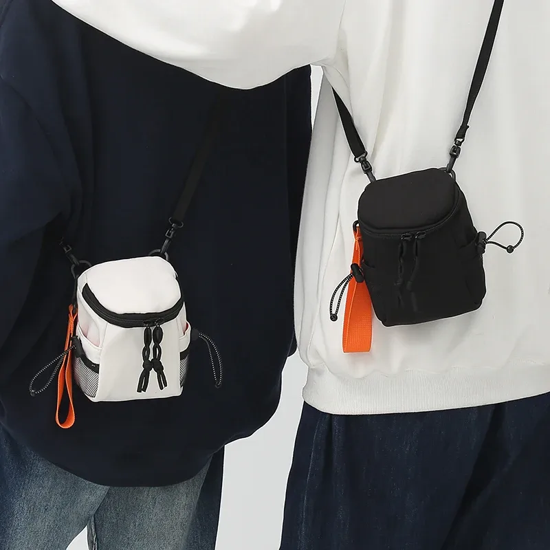 Porte-monnaie suspendu, Mini sac à bandoulière, petit sac à dos pour écouteurs, sac pour téléphone portable, sac à bandoulière pour femmes et garçons