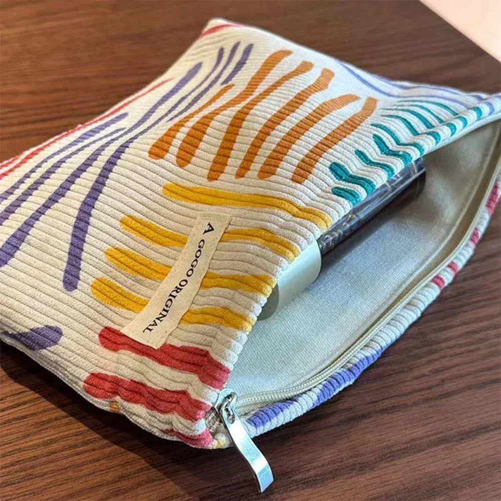 sac à cosmétiques en velours côtelé à rayures colorées, trousse de toilette de voyage portable, soins de la peau, articles divers, sac de rangement de maquillage esthétique pour un usage quotidien