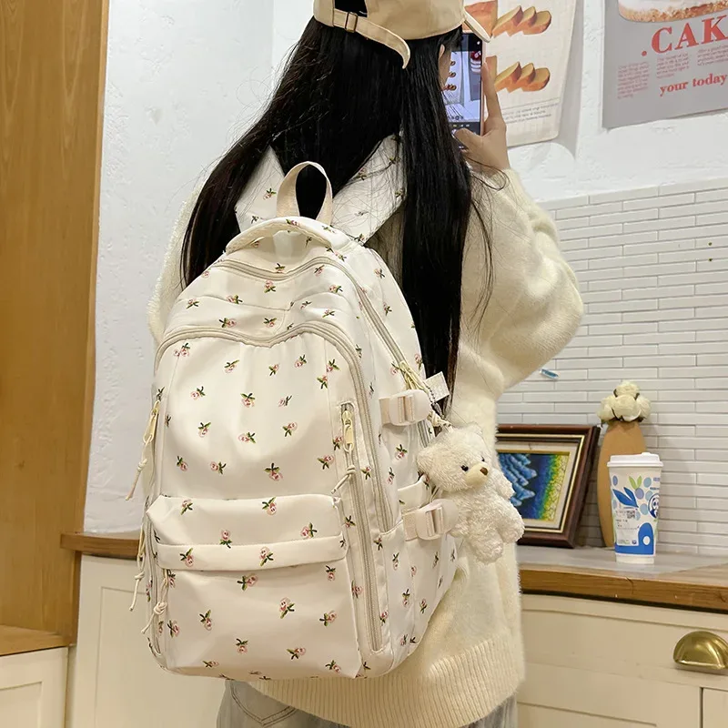 sac à dos décontracté à imprimé floral grande capacité pour filles, sac d'école en nylon imperméable, capacité pour ordinateur portable 14 pouces, style frais et doux