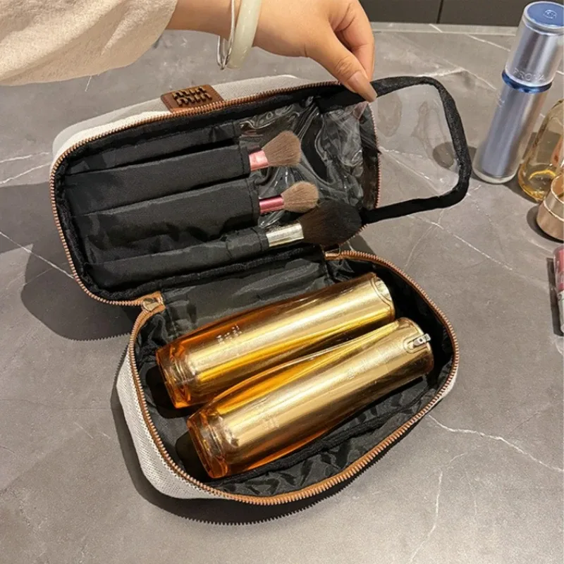 nouvelle trousse de maquillage portable en toile rétro de luxe avec étiquette métallique, de haute qualité et multifonctionnelle, idéale pour les voyages.