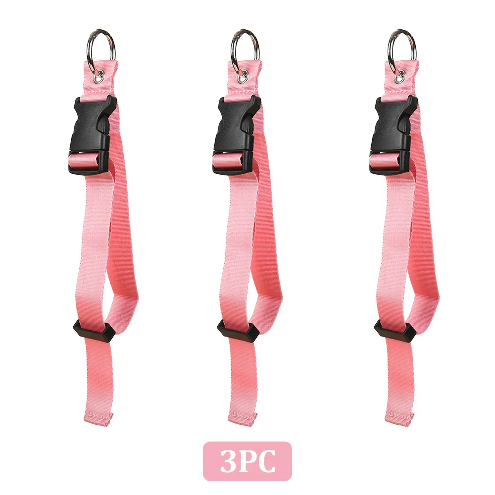 boucle voyage nylon noire rose attachement sac dos sangle anneau métal usage voyage sécurité transport