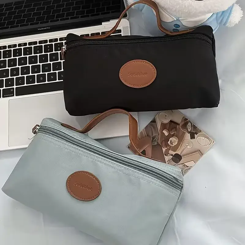 Nouvelle Trousse de Maquillage Portable 2026, Sac Cosmétique à Main Grande Capacité en Nylon, Trousse de Toilette de Voyage pour Femme, Sac de Rangement de Voyage