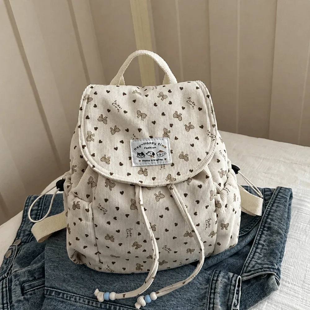 sac à dos léger en velours côtelé à imprimé nœud papillon, grande capacité, design simple, sac à dos à cordon de serrage, sac à livres décontracté et polyvalent pour les courts séjours