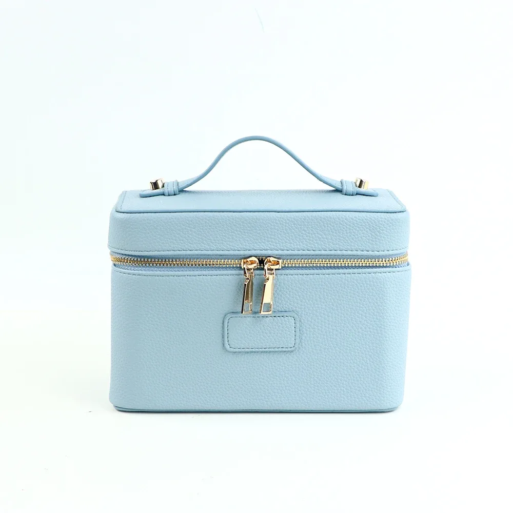 pochette à maquillage personnalisée en cuir pu avec compartiments, grande capacité, et inclut une trousse de maquillage.
