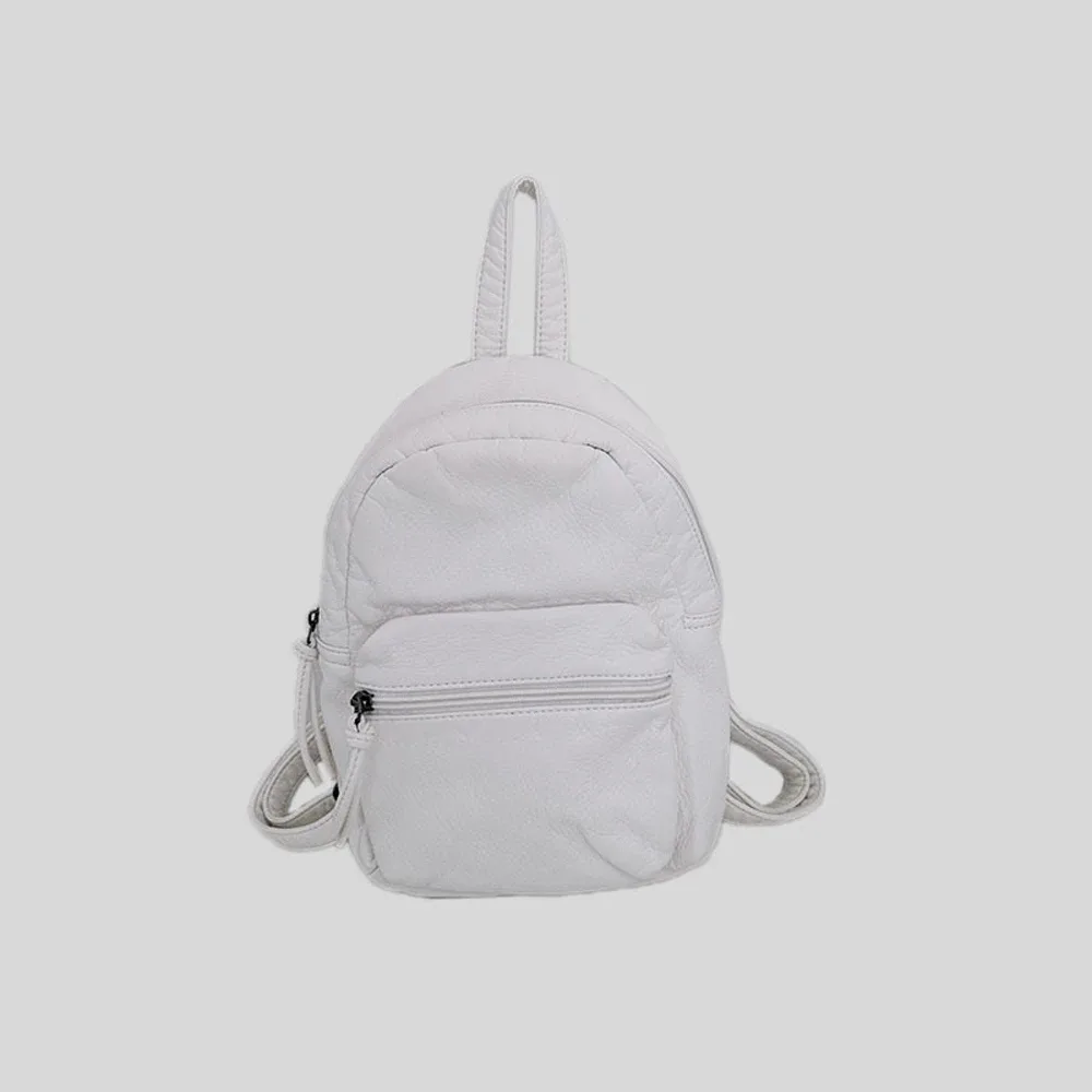 sac dos cuir souple bleu vintage compact poches avant poignet souple fermeture éclair usage quotidien femmes