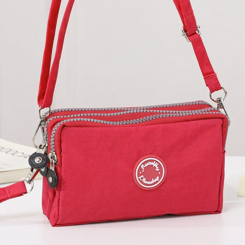 sac à bandoulière de grande capacité pour femmes, sac à bandoulière simple avec trois fermetures éclair pour téléphone et sac de rangement à changement ample