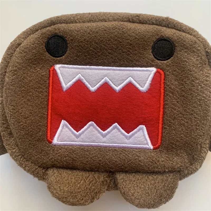 trousse polyester classique dessin animé visage souriant oeil noir bouche rouge oreille marron pochette maquillage voyage beauté