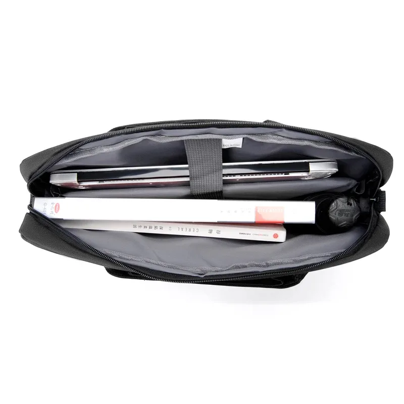 sacoche polyester noire homme bandoulière poignée souple fermeture éclair poches latérales documents ordinateurportable voyage business
