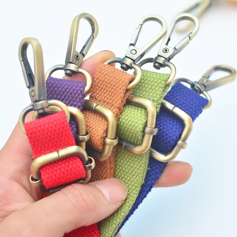 sangle sac nylon couleur variée motif boucle dorée bandoulière pratique voyage jour usage multifonctionnelle durables accessoires travail