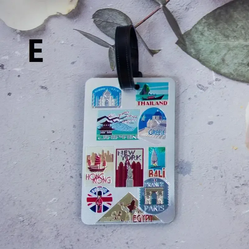 étiquette bagage motifs voyages destinations mondiales symboles avion couleur bleue rectangulaire anneau fixation voyage croisière identification bagages embarquement