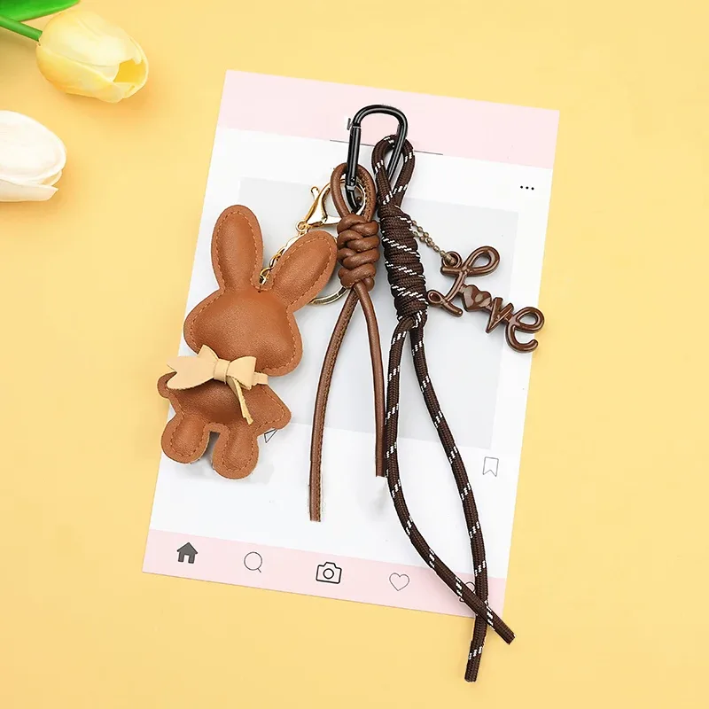 adorable porte-clés en cuir pu en forme de lapin avec petit nœud, pendentif animal mignon pour sacs à main et sacs à dos.