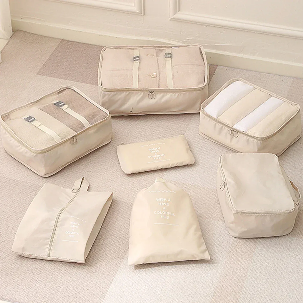 organisateur voyage polyester gris beige poches zippées compartiments petite taille grande taille compression sac valise accessoires vêtements rangement pratique fonctionnel