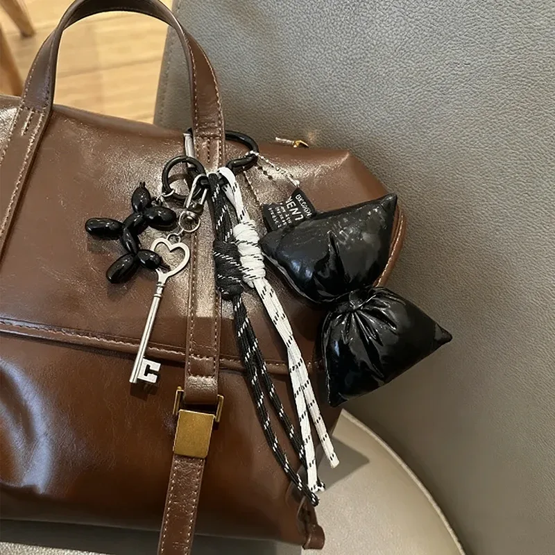 porte-clés à nœud en cuir matelassé doux, organisateur, mini breloque de sac mignon pour filles, porte-clés à nœud coréen avec pendentif