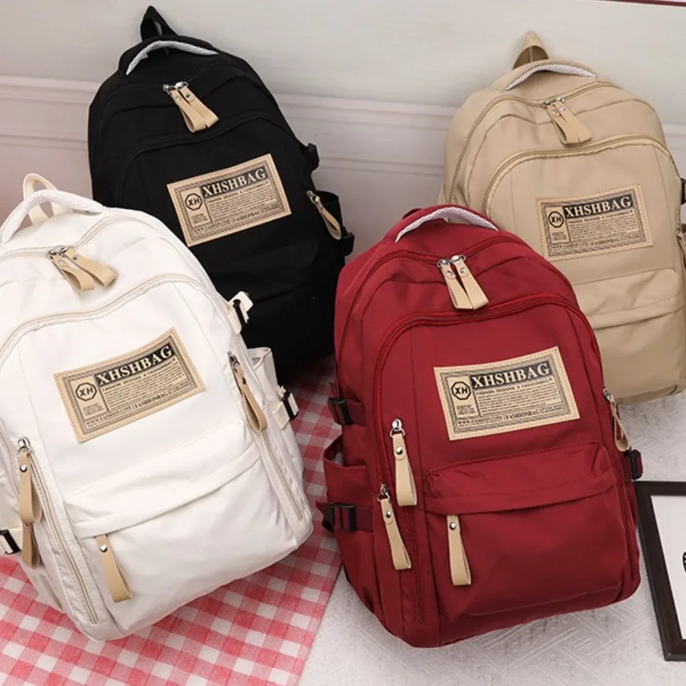 sac dos nylon solide beige rouge noir kaki décontracté poignée souple fermeture éclair usage journalier