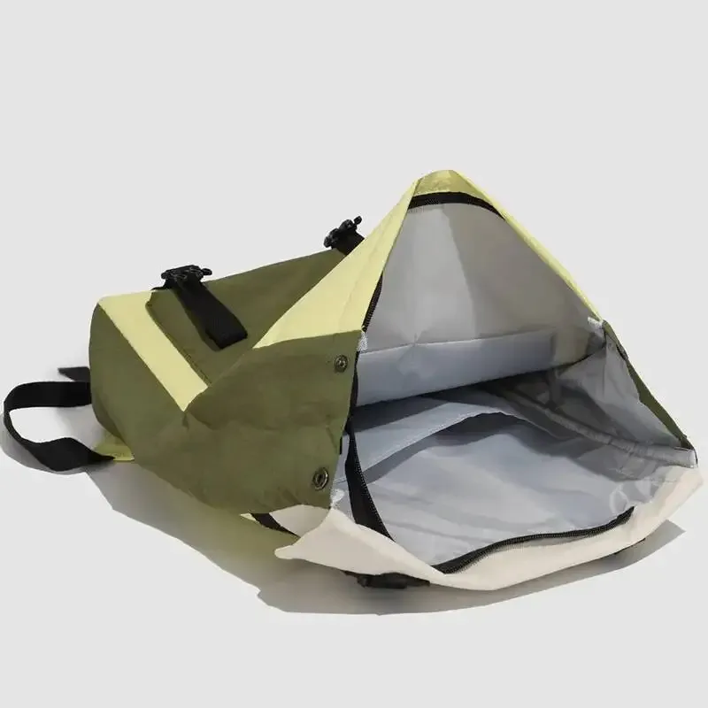 sac dos nylon vert olive jaune citron bandoulière rétractable poche intérieure imperméable usage voyage