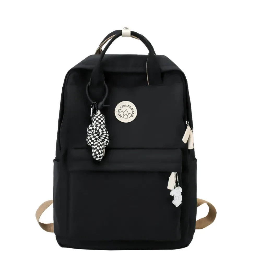 sac à dos imperméable pour femmes, en nylon, couleur unie, sac à dos de voyage ergonomique, grande capacité, sac pour ordinateur portable et livres, idéal pour les voyages d'affaires.