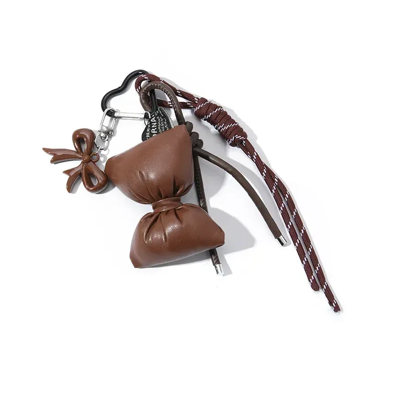 porte-clés à nœud en cuir matelassé doux, organisateur, mini breloque de sac mignon pour filles, porte-clés à nœud coréen avec pendentif