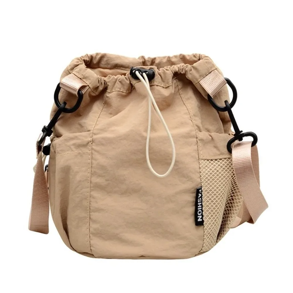 sac à bandoulière simple portable en nylon, petit sac léger de couleur unie pour l'extérieur